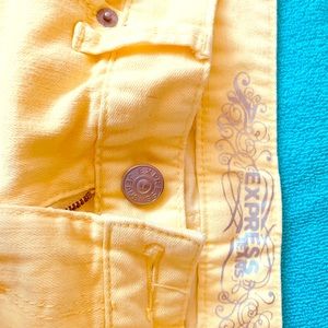 Pale-yellow, short-shorts.